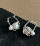 Saturn Whispers Cosmic Pearl Ear Studs - Dynamic Designer Jewelry for Everyday Elegance