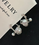 Saturn Whispers Cosmic Pearl Ear Studs - Dynamic Designer Jewelry for Everyday Elegance