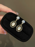 French Light Retro Mother-of-Pearl Pearl Earrings | Elegant Oceanic Whispers