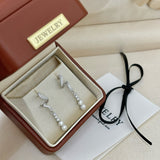 Galaxy Whisper Pearl Drop Earrings - Sleek Dangling Elegance