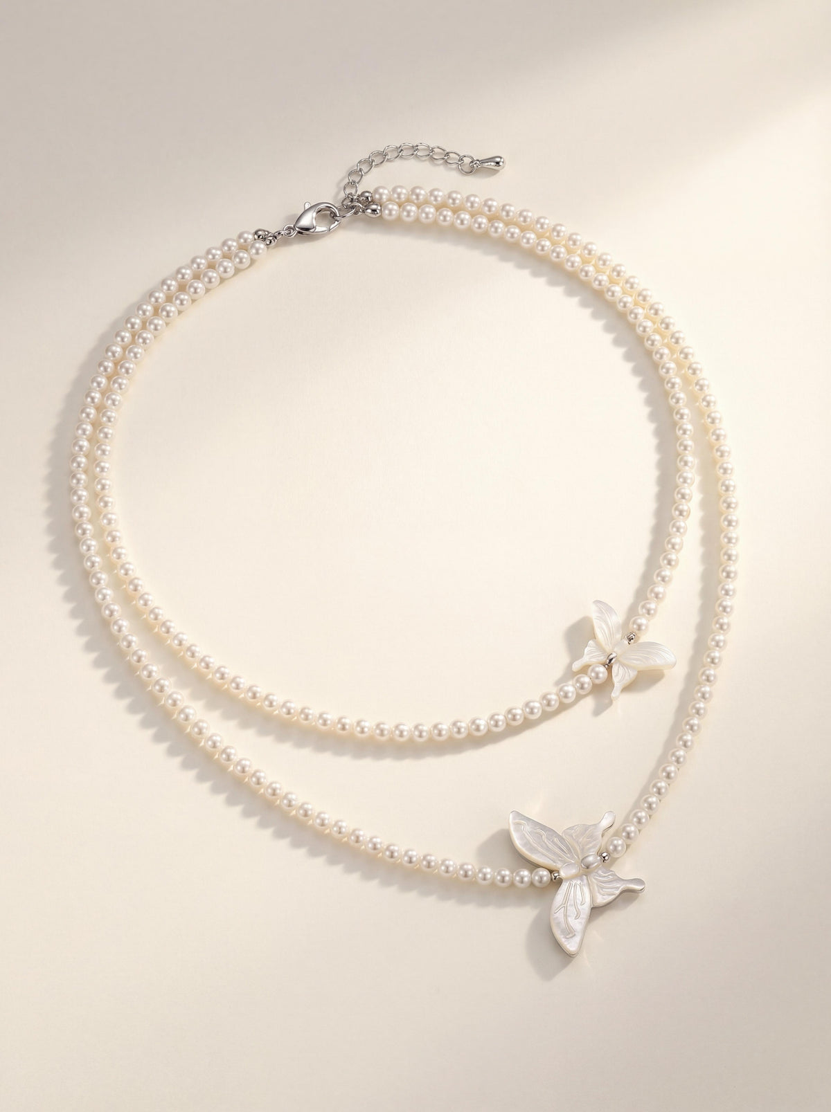Layered MotherofPearl Butterfly Pearl Necklace - Dual Strand Necklace for Effortless Elegance