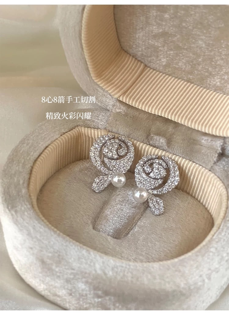 Moonlit Rosette Pearl Earrings by Investors' Choice
