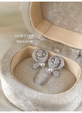 Moonlit Rosette Pearl Earrings by Investors' Choice