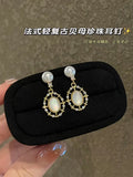 French Light Retro Mother-of-Pearl Pearl Earrings | Elegant Oceanic Whispers