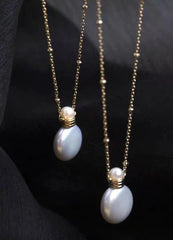 Baroque Freshwater Pearl Perfume Bottle Pendant Necklace – 14mm Elegant Button-Like Luster (Copy)